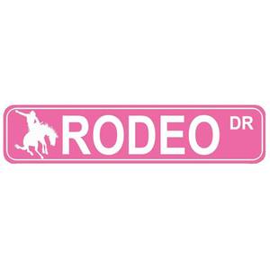 lot 670 image: Rodeo DR Sign, Cowboy Cowgirl Horse Show Lover Metal Tin Decorative Signs for Street Home Door Kitchen Bedroom Farm House Garage Gardening Wall Decor 16 x 4 Inch (pink)