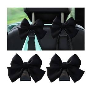 lot 685 image: Mandark 2PCS Car Seat Headrest Hooks, Cute Bow Vehicle Hooks for Purses and Bags, Automotive Purse Hook Hanger Interior Decoration Accessories, Universal for SUV, Sedan, Truck (Black Line) - Retail $8