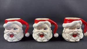 lot 10 image: Set of 3 Santa Claus Face Christmas Mugs