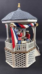lot 15 image: Dept 56 Patriotic Band Musical Figurine Approximately 8 inches Tall