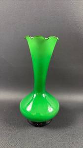 lot 17 image: Vintage green opaline glass soliflore vase featuring a distinctive flared, ruffled edge (approximately 6 inches tall)
