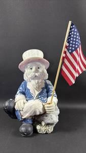 lot 19 image: Uncle Sam Patriotic Resin Yard Art Figurine with American Flag (Approximately 9 inches tall)