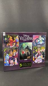lot 34 image: Disney Villains 5 Puzzle Set by Ceaco 2 of the Five Bags open, appear complete
