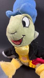 lot 44 image: Disney Jiminy Cricket Plush Toy (7 inches tall when seated)