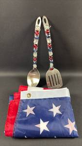 lot 65 image: 60 Inch Long Nylon American Flag and Decorated Serving Tools