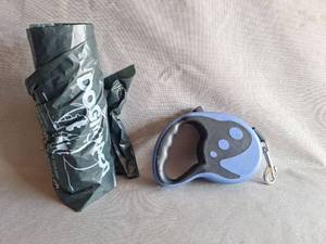lot 84 image: Retractable Dog Leash, Waste Bags, Food Dish, Can Food Lid For Various Sizes