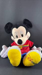 lot 109 image: Vintage 2002 Disney Fisher-Price Jumbo ( 14 inches seated )Mickey Mouse plush toy featuring a red shirt with yellow detailing.