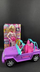 lot 308 image: Pastry Chef Barbie with Articulated Elbows, Knees and Barbie Off Road Vehicle