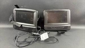 lot 310 image: RCA Dual Screen Portable DVD Player with Car Headrest Mounts