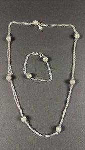 lot 324 image: Sarah Coventry Silver Tone Necklace and Bracelet with Rhinestone Sparklers