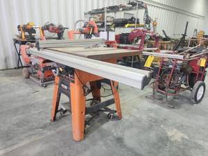 lot 16663 image: RIDGID TS3650 Cast Iron Table Saw with Fence System