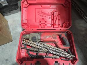 lot 17857 image: Milwaukee 1 inch SDS Plus Rotary Hammer Drill with Bits and Case