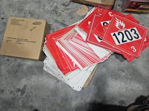 lot 18235 image: Hazmat Placards Collection with Battery Tender Solar Panel Charger