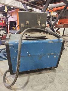 lot 16795 image: Miller CST 280 Stick Welder with Cables