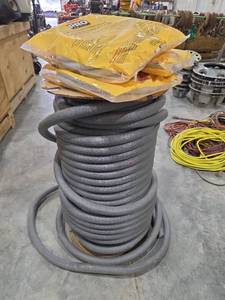 lot 18466 image: 34 Inch Closed Cell Backer Rod Foam Sealant and Spool of Foam Backer Rod