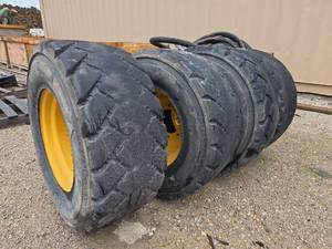 lot 13386 image: John Deere 14 X 17.5  Galaxy Tires and Wheels - Set of 4