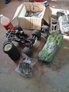 lot 2 image: Traxxas Revo 3.3 and accessories.