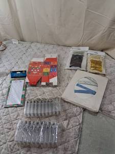 lot 65 image: Party Supplies Bundle with Foil Fringe Curtains and plastic lights