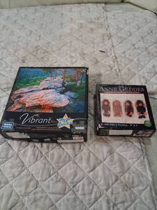 lot 66 image: Jigsaw Puzzle Bundle - Vibrant 1000 Piece and Anne Geddes 100 Piece