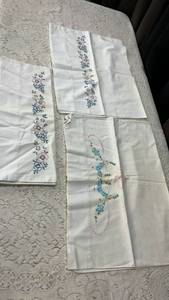 lot 81 image: Hand Embroidered White Cotton Pillowcases with Floral Design
