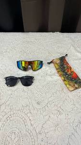 lot 94 image: Two Pairs of Sunglasses - Sport Mirrored and Classic Black Frame