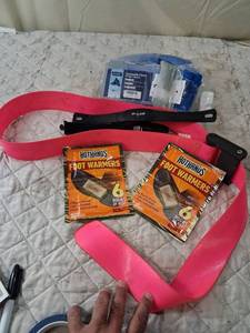 lot 105 image: Mixed Lot of Disposable Shoe Covers Polar Heart Rate Monitor and Foot Warmers