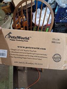 lot 115 image: PetsWorld Puppy Training Pads 23x36 Bulk Case