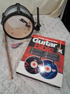 lot 120 image: SPL Electronic Pad and Interactive Guitar Bible Learning Set