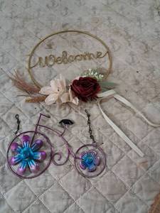 lot 180 image: Welcome Hoop Sign with Metal Bicycle Decoration and Floral Accents