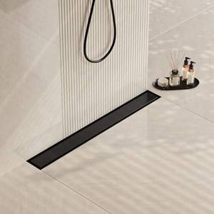 lot 2456 image: Neodrain 24 in Matte Black Linear Shower Drain- with 2-in-1 Flat & Tile Insert Cover, 304 Stainless Steel Rectangle Shower Floor Drain,Floor Shower Drain - Retail $67