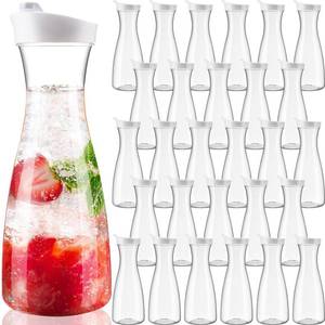 lot 2493 image: Reallnaive 30 Packs Plastic Carafe with Lids, 34 oz Clear Mimosa Juice Containers, Acrylic Beverage Carafe Pitcher Drink Containers for Fridge Outdoor Iced Tea Juice Party Mimosa Bar(Trendy) - Retail $100