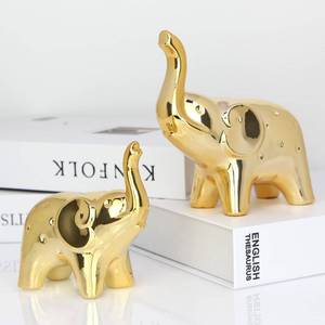 lot 2450 image: prosfalt A Pair Elephant Statue Home Decor,Modern Style Figurines,Sculpture for Office Desktop Bookshelf Living Room (Ceramics Gold)