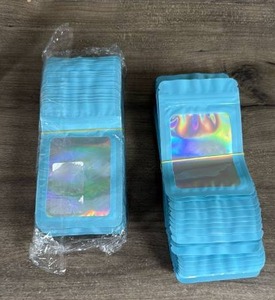 lot 183 image: Blue Holographic Mylar Bags with Window
