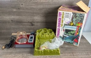 lot 197 image: The Lost World Strange Change Toy with Original Box