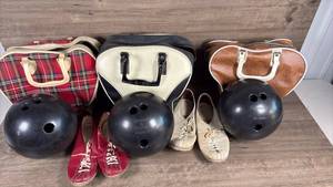 lot 242 image: Vintage Bowling Equipment Set with Balls, Shoes, and Carrying Bags