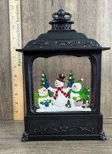 lot 267 image: Black Christmas Snowman Lantern with LED Light