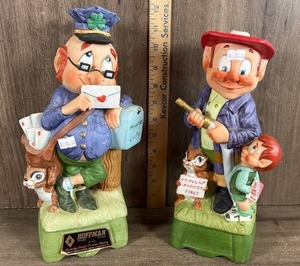 lot 286 image: Hoffman Whiskey Decanters Mailman and Lumberjack Figurines Set