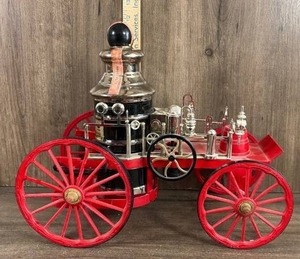 lot 287 image: Jim Beam Fire Engine Decanter with Red Wagon Cart