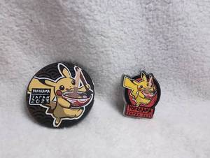 lot 704 image: Pokmon Pikachu Yokohama Japan 2023 Pin Set with Black Pokeball Medallion