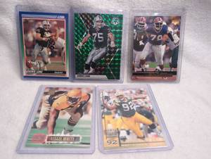 lot 2009 image: NFL Football Trading Card Collection Lot - Howie Long, Bruce Smith, and Reggie White
