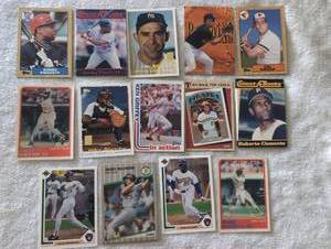 lot 3010 image: Classic Baseball Trading Cards Collection Mixed Years Topps Donruss - including Roberto Clemente, Yogi Berra, Ken Griffey, Kirby Puckett and Cal Ripken among others