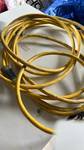 lot 50524 image: Yellow Extension Cord with Electrical Plug