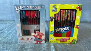 lot 2014 image: Kool-Aid and Nerds Holiday Candy Canes 24 Count Set. 14 count Nerds. 21 count kool-aid.