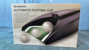 lot 2161 image: Brookstone Automatic Putting Cup Golf Training Aid