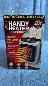 lot 8025 image: Handy Heater Turbo Heat Wall Outlet Space Heater with Digital Display