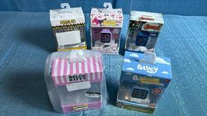 lot 8047 image: Character Smart Watches Collection Bundle - Hello Kitty, Peanuts, Avengers, My Melody, Bluey