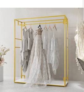 lot 16864 image: HOMEKAYT Gold Clothing Racks with Shelves, Weeding Dress Retail Clothes Rack,Freestanding Rack, Shoes Bags Clothes Organizer Garment Rack (59 L) - Retail $225