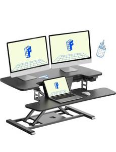 lot 16876 image: FLEXISPOT 35 inch Electric Standing Desk Converter, Motorized Stand up Desk Riser, Monitor and Laptop Workstation with Wide Keyboard Tray, Black - Retail $239