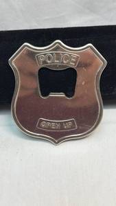 lot 40 image: Police Badge Bottle Opener