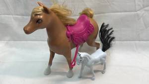 lot 73 image: Horse and Foal Set with Saddle